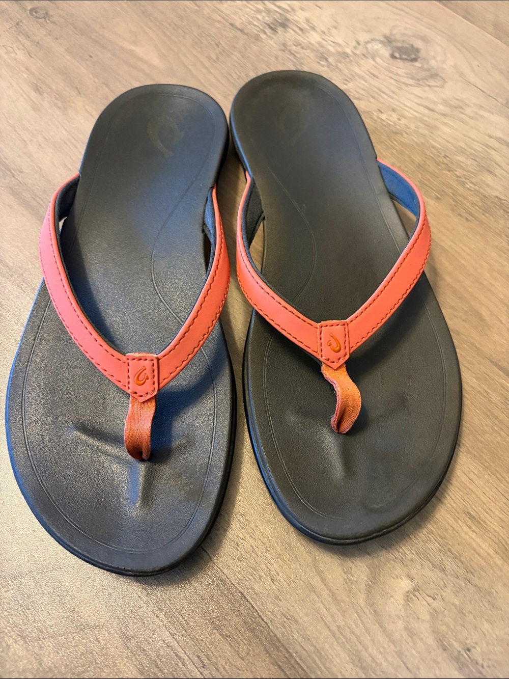 OluKai Coral and Black Thong Sandals